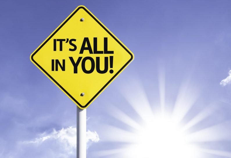 It's,All,In,You,Road,Sign,With,Sun,Background